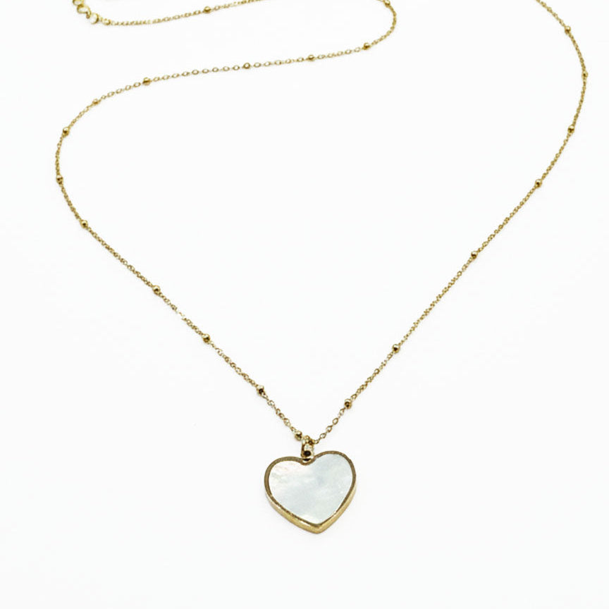 Heart-shaped pendant necklace on a white background